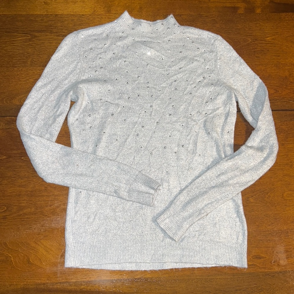 Beautiful, jeweled, high collar sweater.